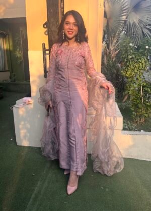 long kameez with floral work, cigarette pants and ruffle dupatta.