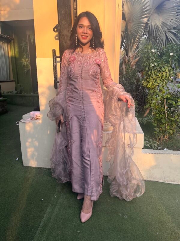 long kameez with floral work, cigarette pants and ruffle dupatta.