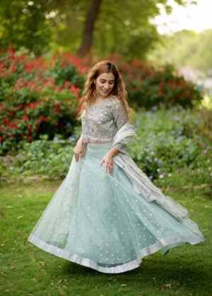 Ice-Blue Lehenga with embellished blouse.