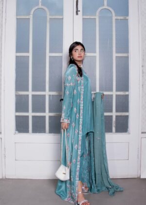 A long embellished coat paired with cigarette pants, short shirt and embellished dupatta.