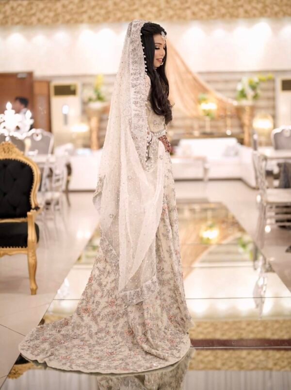 Ivory Lehenga with intricate hand embellishment of kora, dabka, resham and stones.